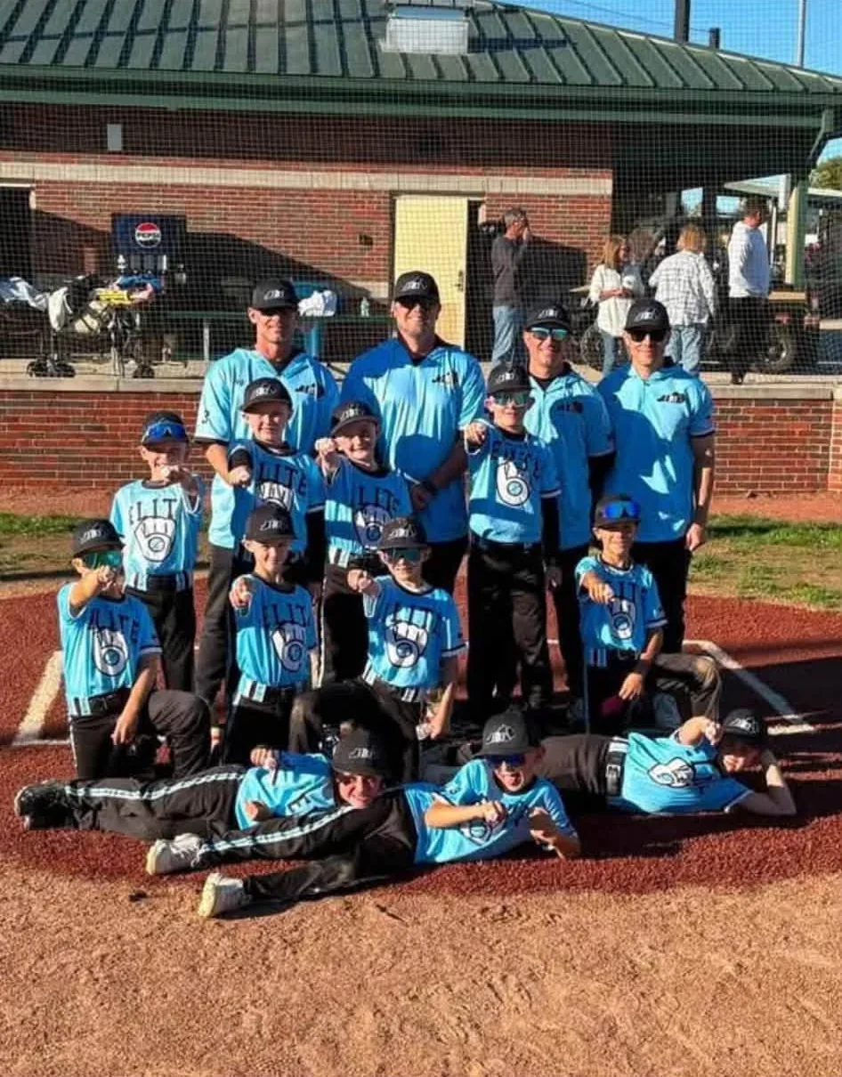 B3 Elite 9U Turner players and coaches on the field after winning the Power in Pink Tournament, October 2026